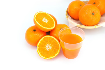 Group of orange fruit on bamboo basket
