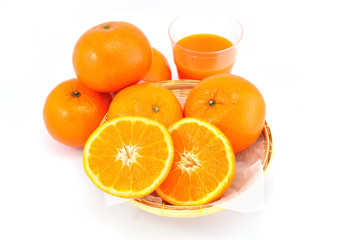 Group of orange fruit on bamboo basket