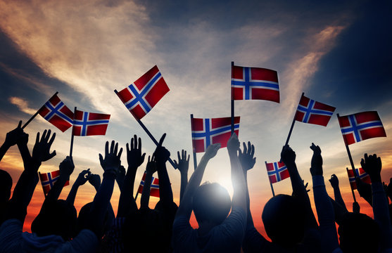 Group People Waving Norwegian Flags Back Lit Concept