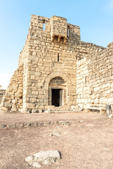 Main entrance of Qasr Azraq is a large fortress in Azraq, Jordan