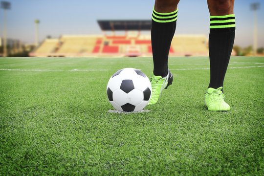 Soccer ball on field in stadium