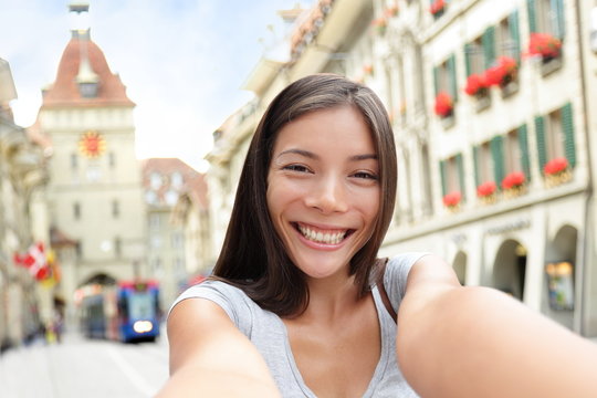 Woman taking selfie in Bern Switzerland