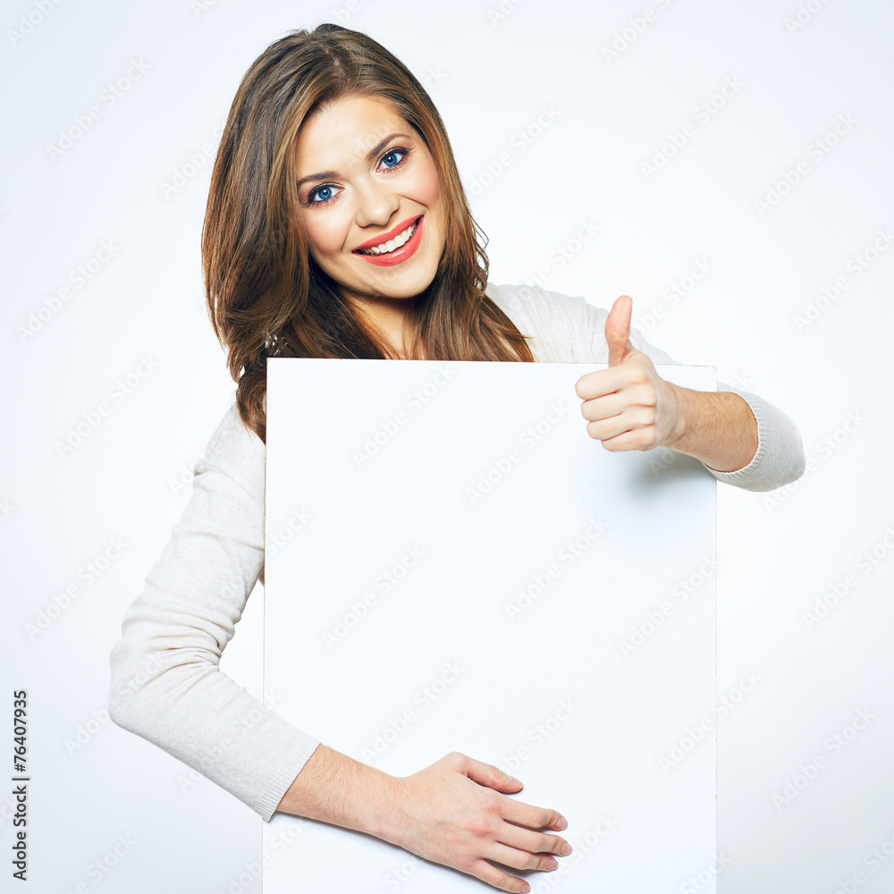 Wall mural woman holding white sign card.