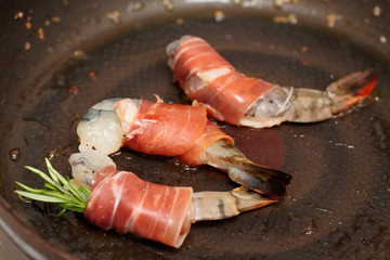 Shrimps being fried on pan