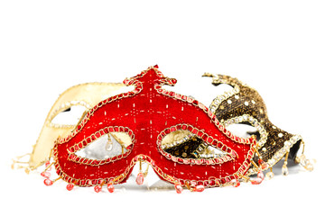 Red carnival mask in the front