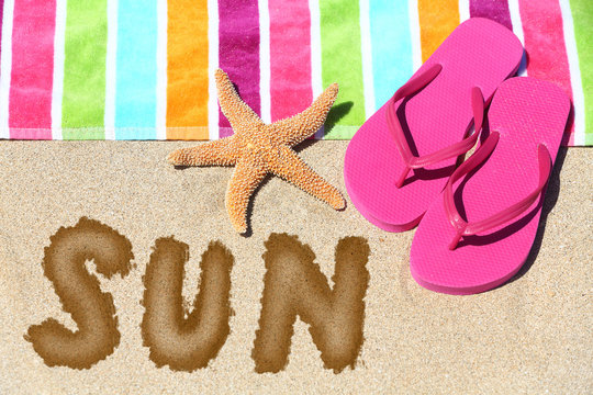 Word - Sun - on a tropical beach