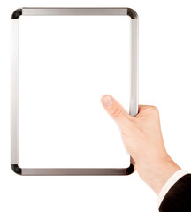 Businessman in suit holding an empty whiteboard (magnetic board)