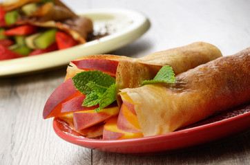 Crepes with peaches