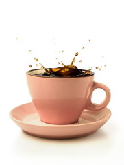 coffee splash in pink cup