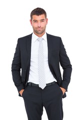 Smiling businessman looking at camera