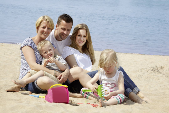 Family spends a day at the beach.