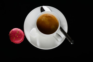 hot drink black espresso coffee with macaroon
