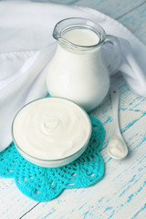 Dairy products on wooden table background