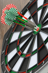 Dart board with darts