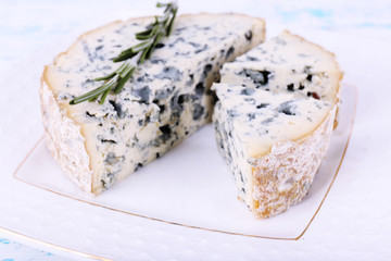 Blue cheese with sprigs of rosemary