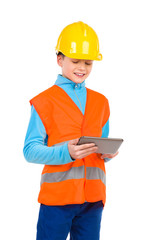 Little construction worker using a digital tablet