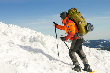 Hiker in winter mountains