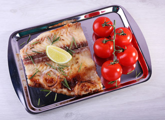 Dish of Pangasius fillet with rosemary and lime