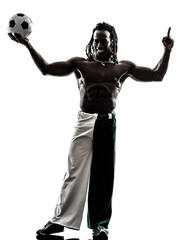  black man soccer player holding showing football  silhouette