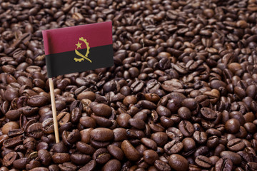 Flag of Angola sticking in coffee beans.(series)