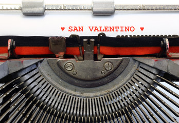 italian written typewriter Saint Valentine and hearts