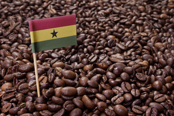 Flag of Ghana sticking in coffee beans.(series)