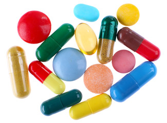 Different colorful pills isolated on white background