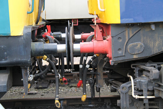 The Connectors and Buffers of Two Train Carriages.