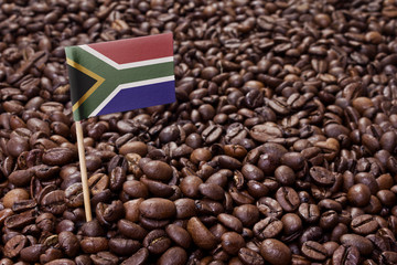 Flag of South Africa sticking in coffee beans.(series)