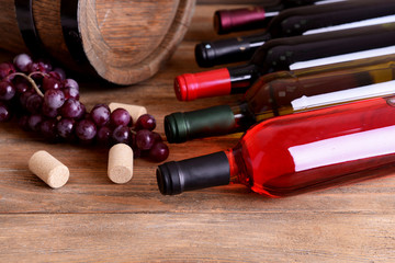 Different bottles of wine on table close-up
