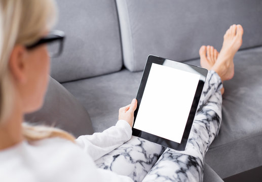 Woman Reading Ebook On Tablet Computer