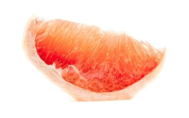 Delicious slice of grapefruit isolated on white