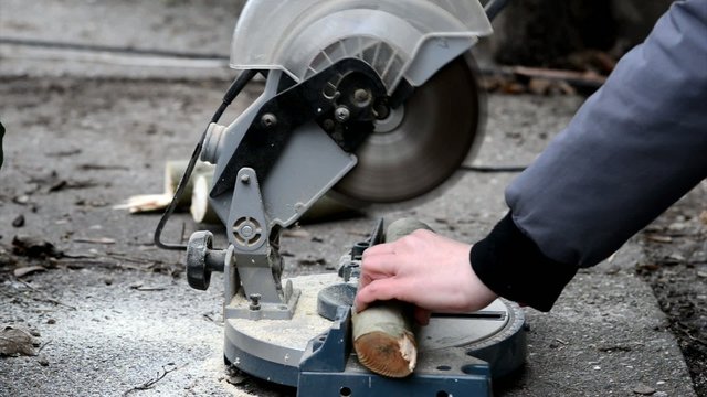 Men cutting wood