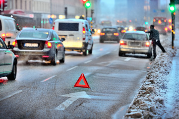 Car broken down, out of fuel in the snow storm