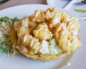 Shrimp fried with cream salad on taro cup fried
