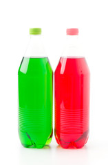 Bottles with soft drinks, isolated on a white background