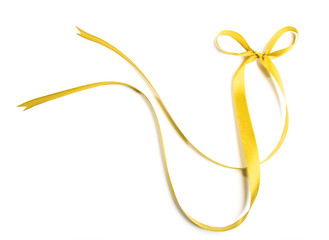 Fabric yellow ribbons and bows. Isolated on white background