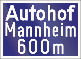 German highway sign announcing an off highway road service (Autohof)