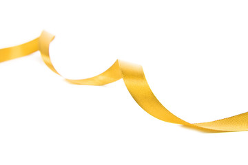 Fabric yellow ribbon. Isolated on white background - obrazy, fototapety, plakaty