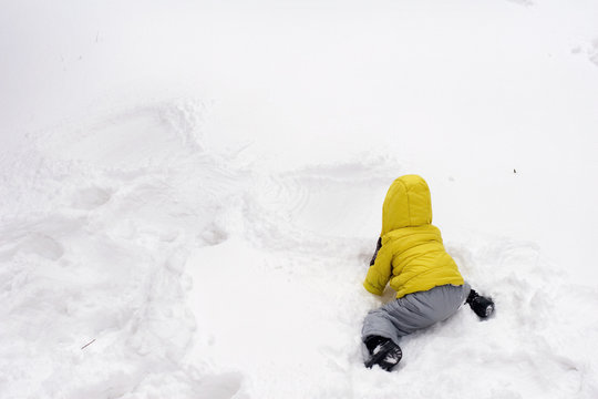 A Little Kid And A Snow Angel