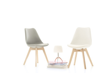 Two stylish modern chairs facing each other