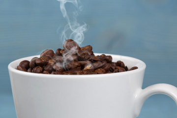 Cup with coffee grains