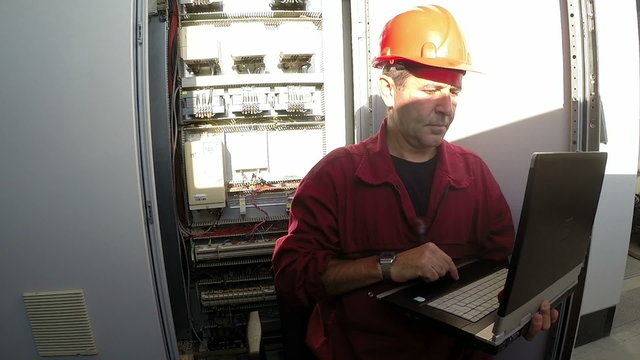 Engineer Using A Laptop Computer
