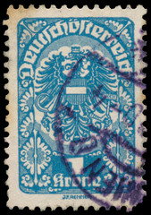 Stamp printed in Austria shows Coat of arms, ornament and eagle