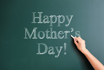 happy mother's day written on blackboard
