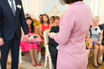 The newlyweds exchanged rings. Solemn registration of marriage. 