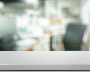 Empty laminate shelf and blurred  background for business produc