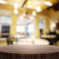 Empty wooden round table and blurred background for product pres