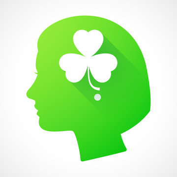 Female head silhouette icon with a clover