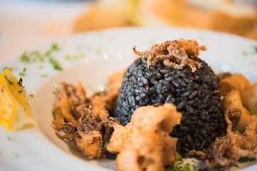 Black risotto with seafood